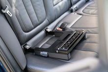 The Gearseat clicks securely into the universal ISOFIX/LATCH mount found in almost every modern car, giving you a rock-solid base for your camera gear.